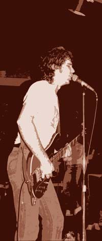 Coyote in St. John's Newfoundland with Fender Mustang guitar